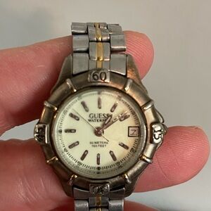 Women’s Guess watch silver and gold